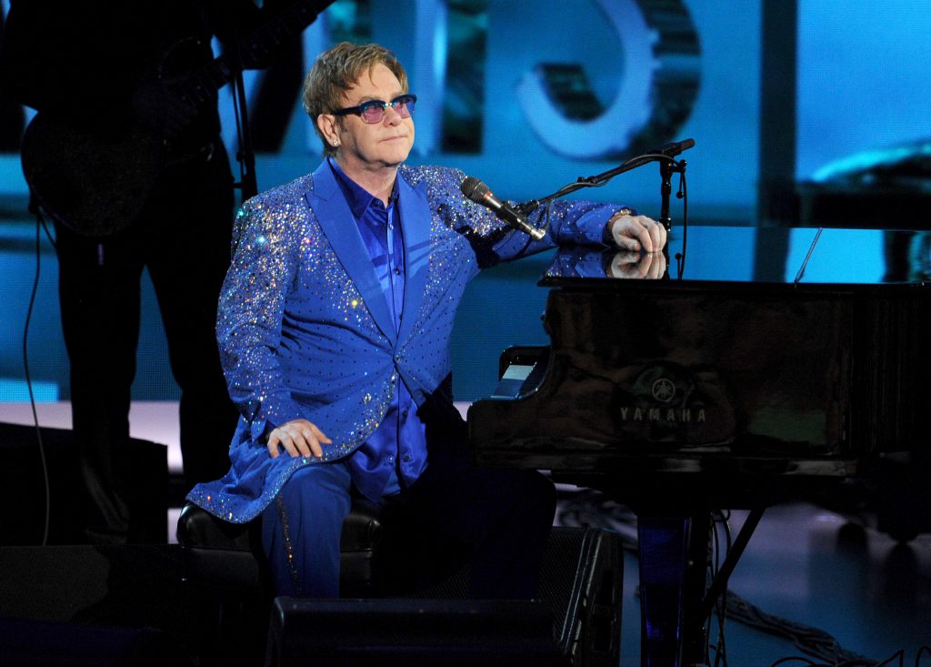 LOS ANGELES, CA - SEPTEMBER 22:  Recording artist Elton John performs onstage during the 65th Annual Primetime Emmy Awards held at Nokia Theatre L.A. Live on September 22, 2013 in Los Angeles, California.  (Photo by Kevin Winter/Getty Images)